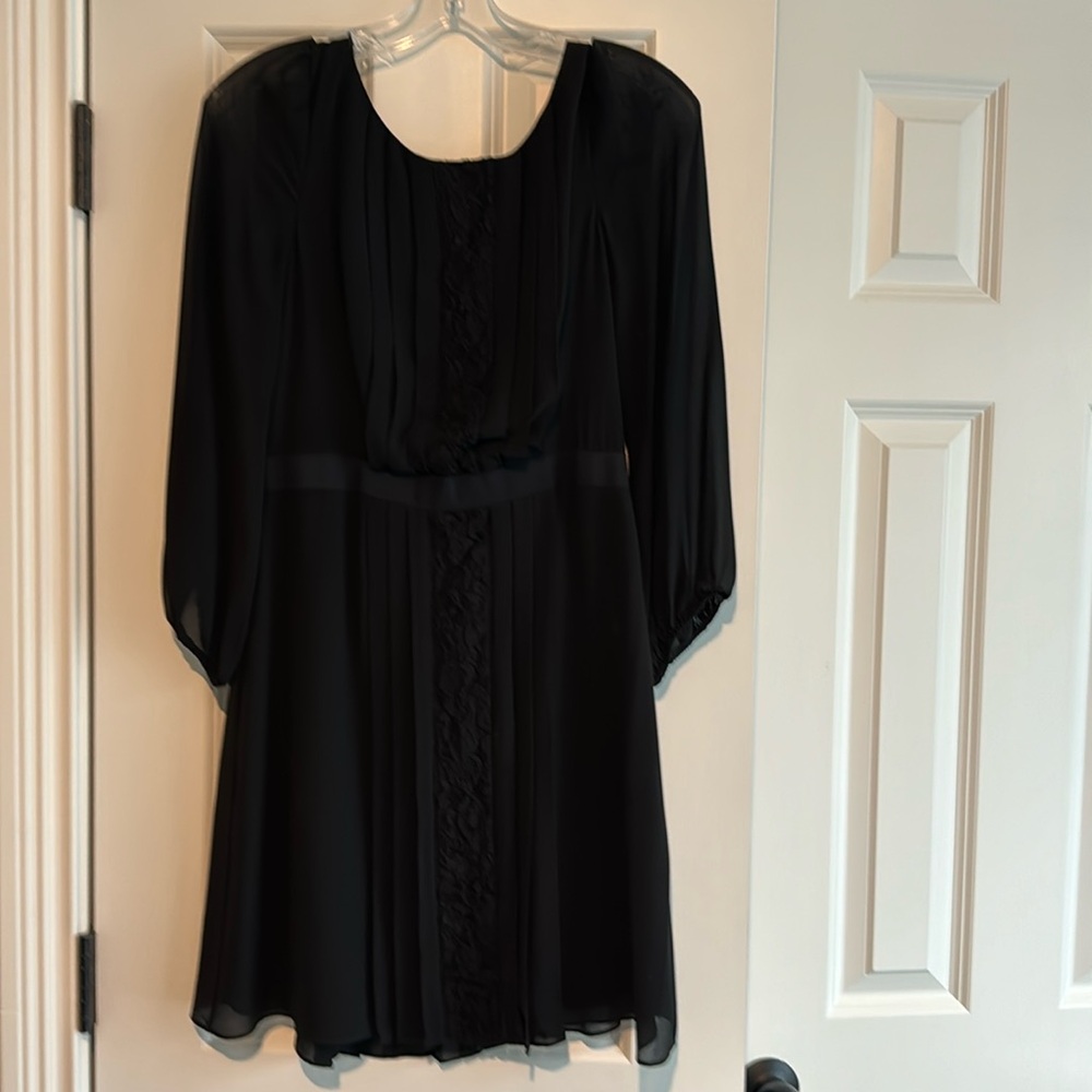 Jessica Simpson above knee black chiffon dress.